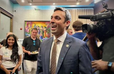 State Sen. Suhas Subramanyam, who won the Democratic primary in Virginia's 10th Congressional District Tuesday, joins supporters at Celebration by Rupa Vira restaurant in Ashburn Tuesday night.