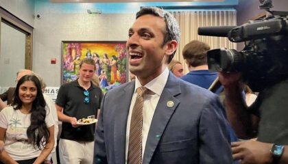 State Sen. Suhas Subramanyam, who won the Democratic primary in Virginia's 10th Congressional District Tuesday, joins supporters at Celebration by Rupa Vira restaurant in Ashburn Tuesday night.