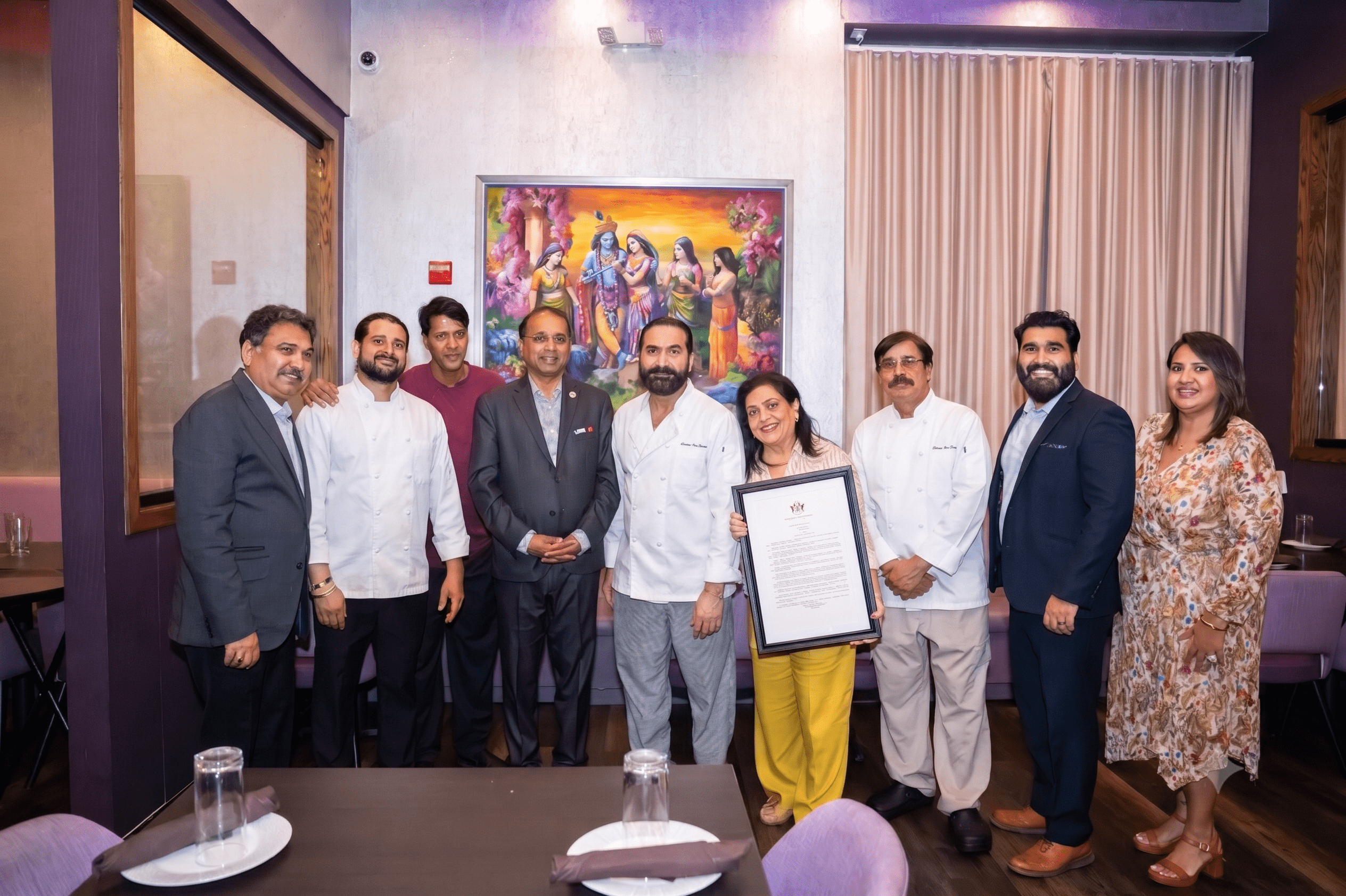 Chef Rupa Vira and the culinary team at Celebration by Rupa Vira with Senator Kannan Srinivasan holding Virginia Senate Resolution No. 158, Ashburn VA